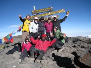 Barb (center back row) and friends Mt Kilimanjaro summit