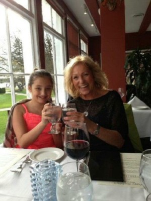 Why Not!  Janet toasting  life with grand daughter Isabella